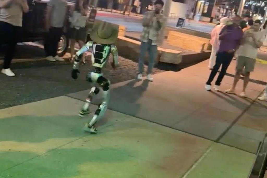 Jake the Rizzbot roaming the streets of Austin, Texas wearing his iconic cowboy hat