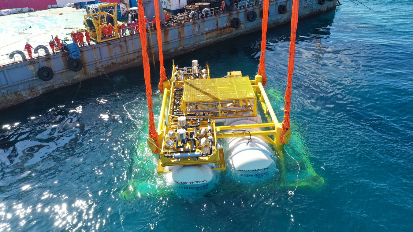 A futuristic underwater data center being constructed near Shanghai, China, showcasing innovation in marine-based cooling and digital infrastructure.