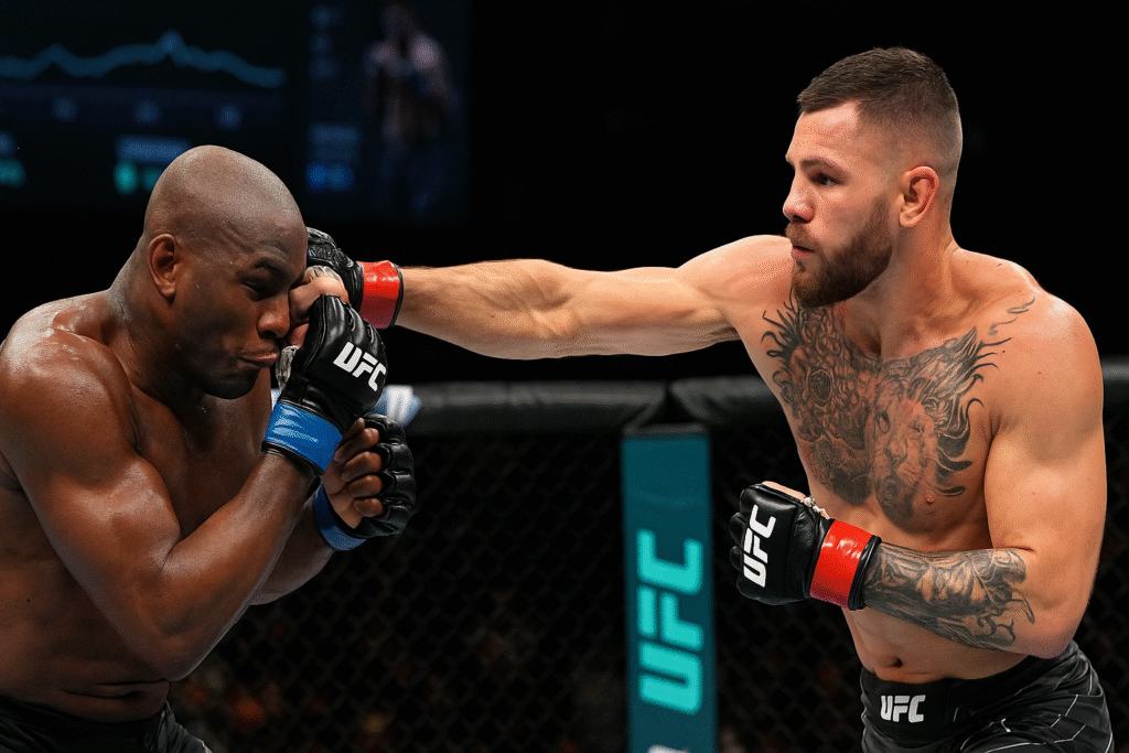 Two UFC fighters mid-fight in the octagon, captured during a high-intensity moment enhanced by UFC AI live streaming technology.