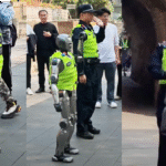 A RoboCop robot in Shanghai directing traffic at a busy intersection, surrounded by pedestrians and city lights