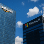 Office towers of Amazon and Microsoft under a bright blue sky, symbolizing dominance in the cloud monopoly market.
