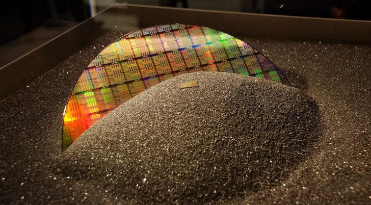GlobalWafers US silicon wafers displayed on protective foam, showcasing advanced semiconductor technology in Texas.