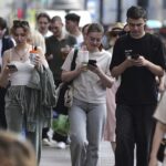 Russian citizens under surveillance as Putin enforces Russia’s state controlled internet, with blocked apps and the Kremlin looming in the background.