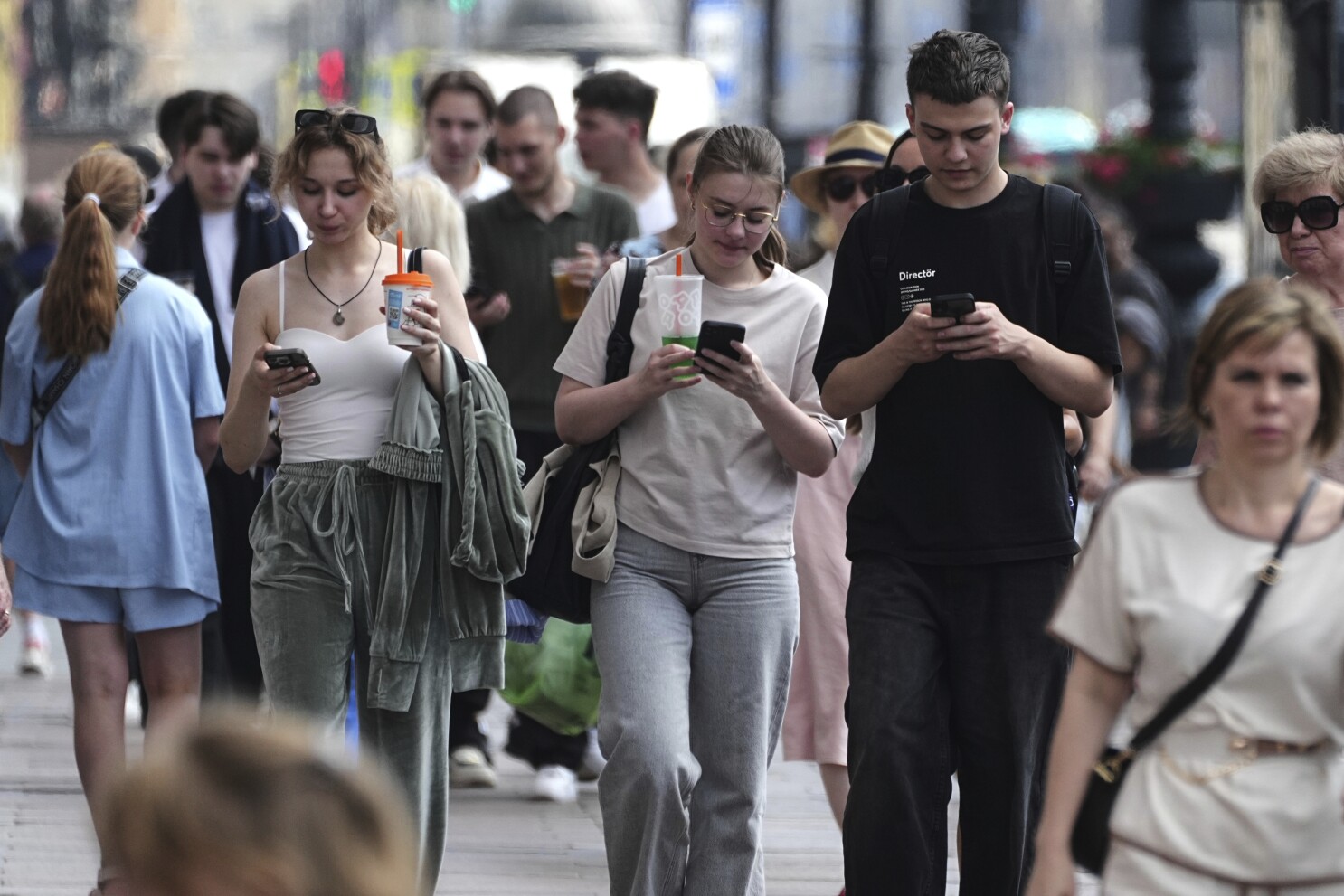 Russian citizens under surveillance as Putin enforces Russia’s state controlled internet, with blocked apps and the Kremlin looming in the background.