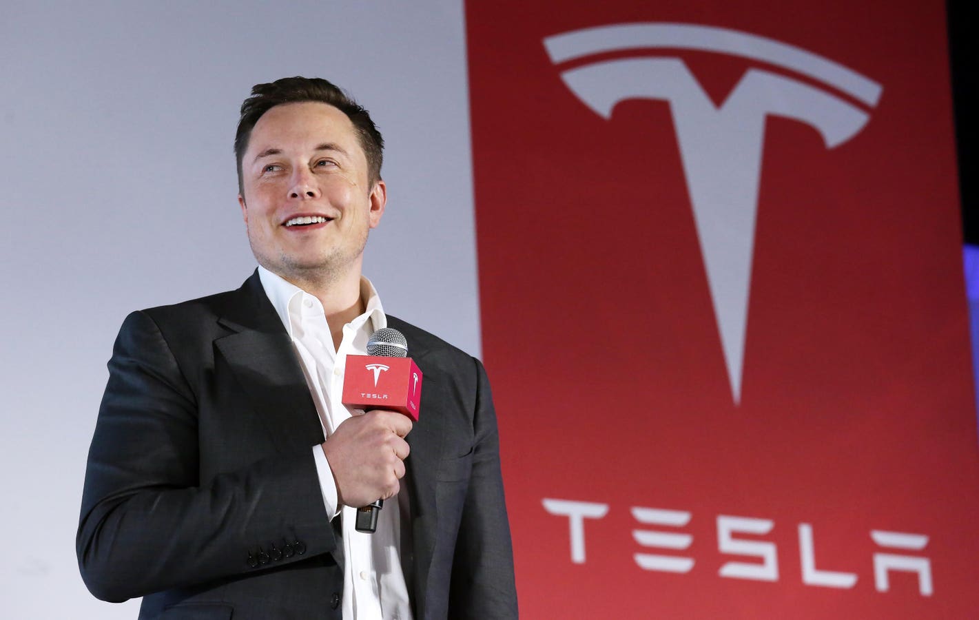 Elon Musk speaking at Tesla event as board approves $30 billion Tesla alternative pay deal amid legal dispute.