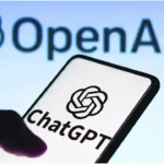Young man receives a break reminder from AI assistant while using a laptop – representing OpenAI updating ChatGPT for healthier user habits