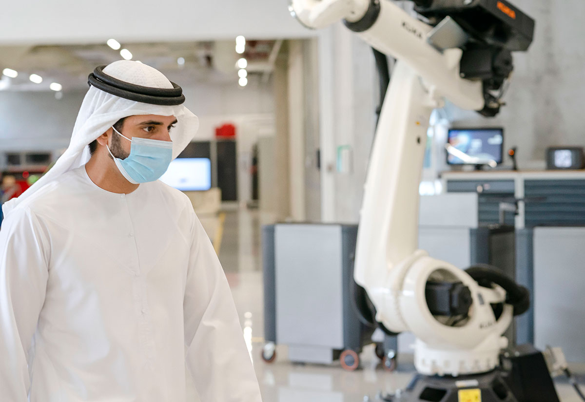 Emirati leader observing advanced robotics at Dubai robot demonstration hosted by Dubai Future Labs