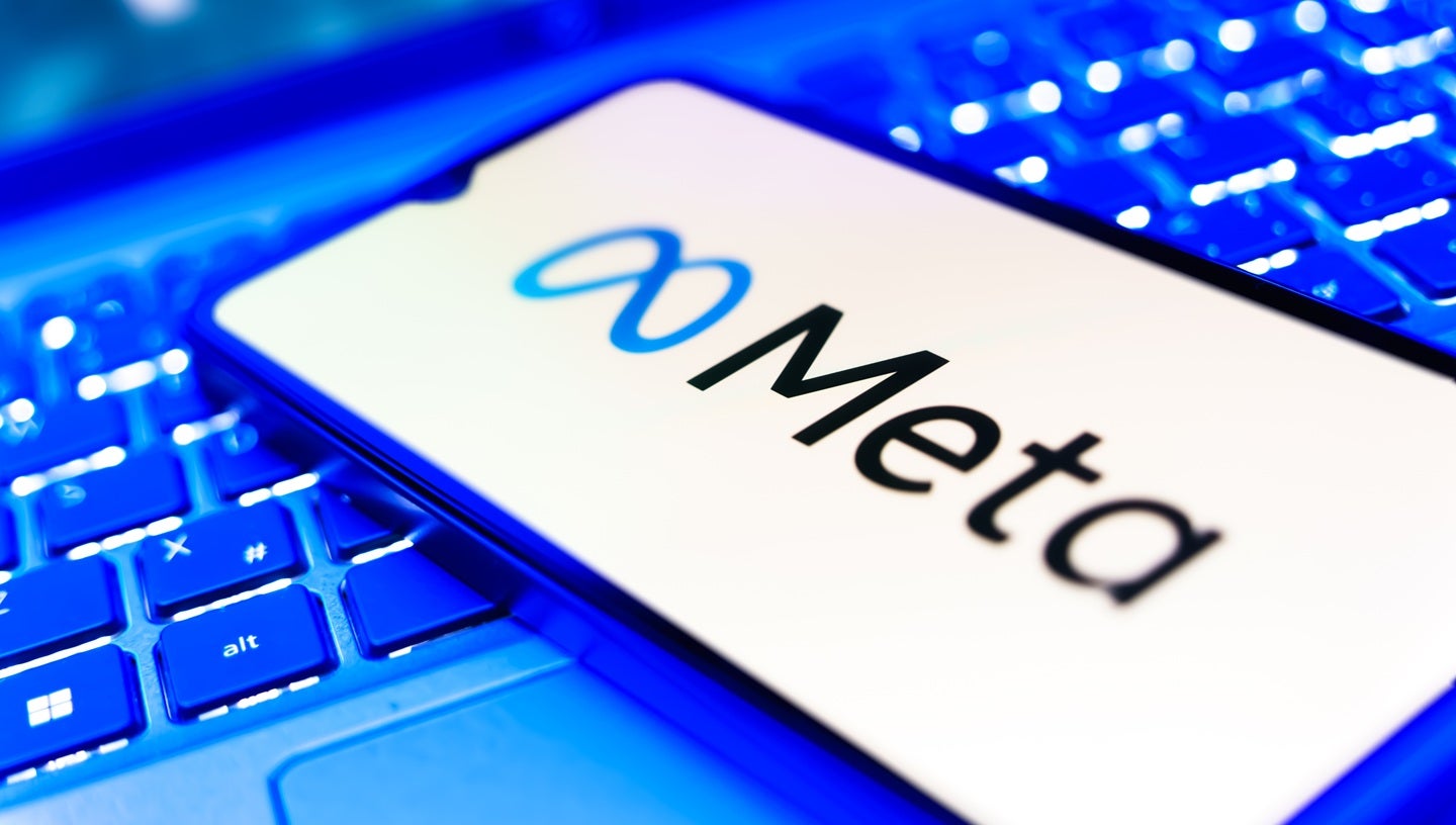 Meta logo on mobile screen, symbolizing Meta data center financing for $29B AI infrastructure project in Louisiana.