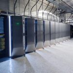 Tesla AI6 chip data center racks replacing Project Dojo supercomputer for next-gen FSD training.