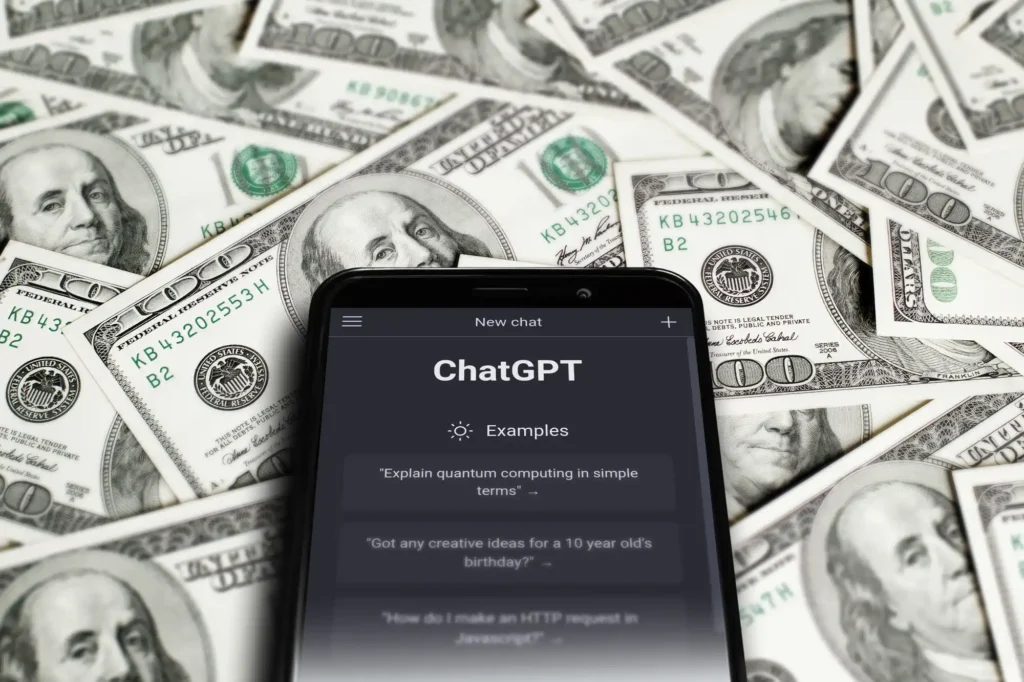 ChatGPT mobile app revenue growth displayed with smartphone and US dollar bills background.