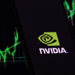 Nvidia logo displayed on a smartphone screen with stock market charts in the background, representing Nvidia Stock rise and AI chip market growth.