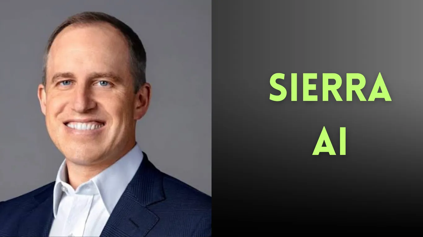 Taylor, co-founder of Sierra AI, standing in front of the Sierra logo after the latest Sierra AI funding series announcement.