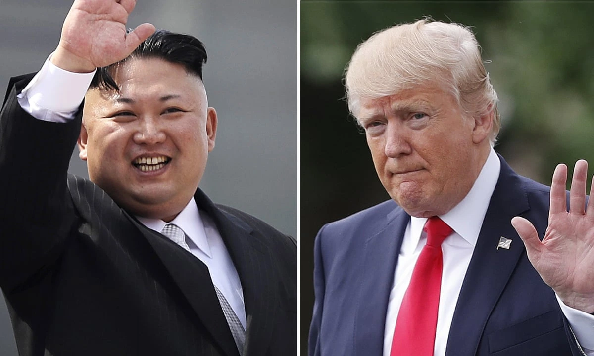 Kim Jong Un and Donald Trump waving during a diplomatic summit, highlighting US-North Korea relations and tensions.