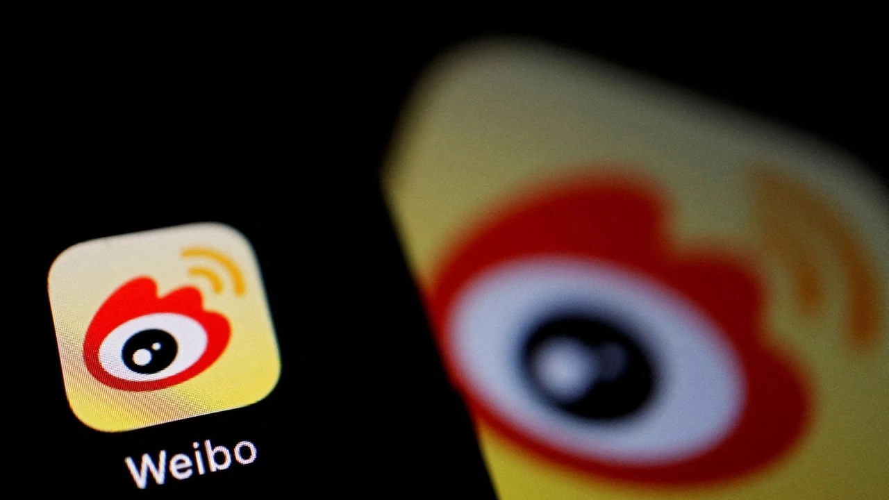 Weibo app logo on a smartphone screen after China internet regulator warnings over content violations.