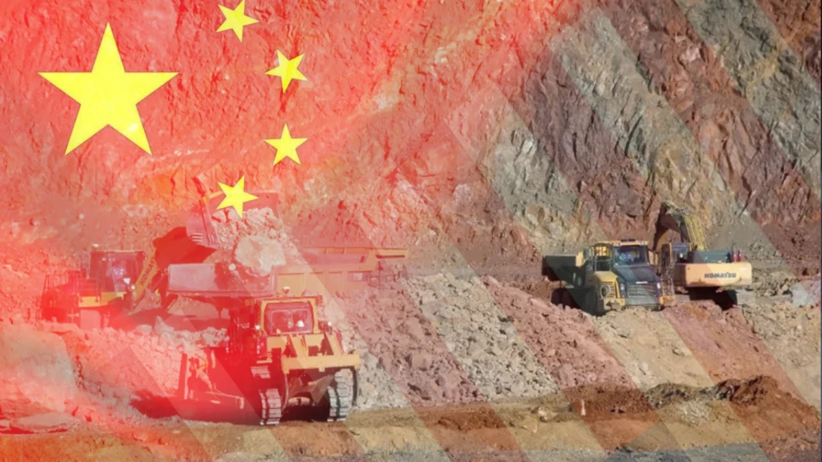 Excavation trucks and heavy machinery operate at a rare earth mining site in China, symbolizing the nation’s new rare earth export controls amid U.S. trade tensions.
