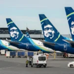 Passengers stranded at airports nationwide after Alaska Airlines outage halts all flights due to major IT system failure.