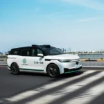 Baidu Apollo Go robotaxi on city road ahead of Switzerland driverless taxi launch