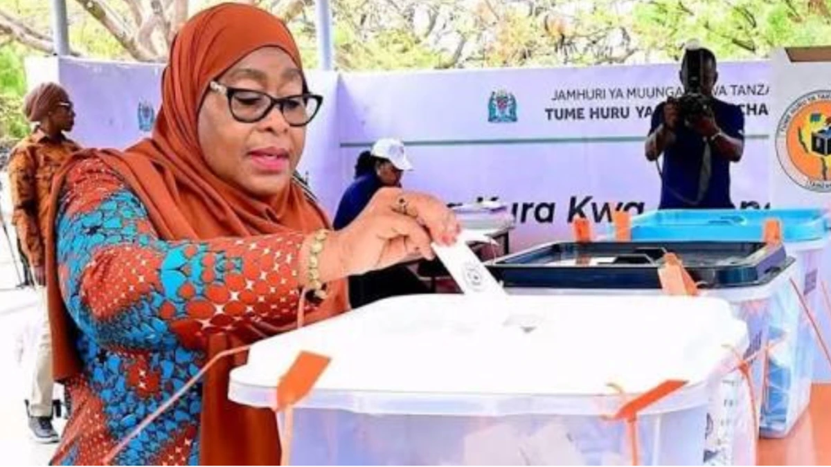 Tanzania President Samia Suluhu Hassan casts her vote during national elections amid reports of unrest and Tanzania election violence