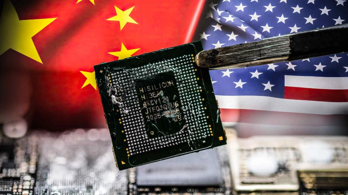 Close-up of a semiconductor chip held between China and U.S. flags amid easing of China chip export ban
