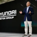 Hyundai Motor investment announcement showing executives discussing $86 billion domestic expansion after U.S. trade deal.