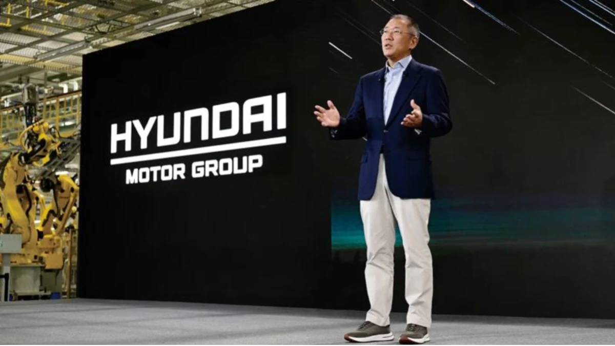 Hyundai Motor investment announcement showing executives discussing $86 billion domestic expansion after U.S. trade deal.