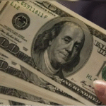 Dollar eases before Fed interest rate decision