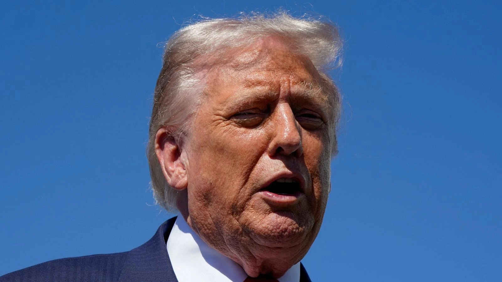 President Donald Trump speaks during a press briefing at the White House as lawmakers remain deadlocked over ACA subsidies and the ongoing government shutdown.
