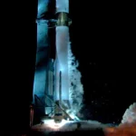 Blue Origin reusable rocket New Glenn booster landing on ocean barge during successful recovery mission