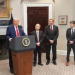 Stargate project leaders including OpenAI, Nvidia, and Oracle executives standing with President Trump during the AI infrastructure announcement