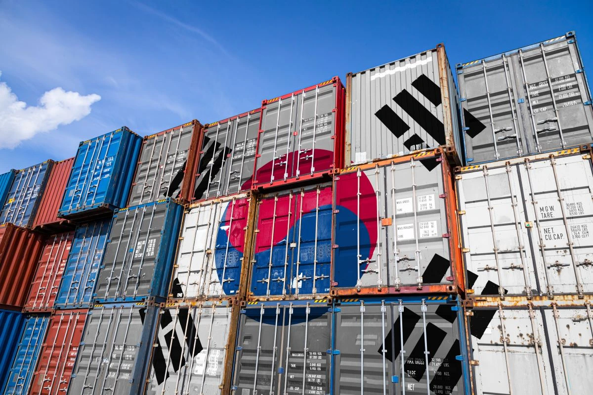 South Korean cargo containers at a port representing record November exports in chips and autos