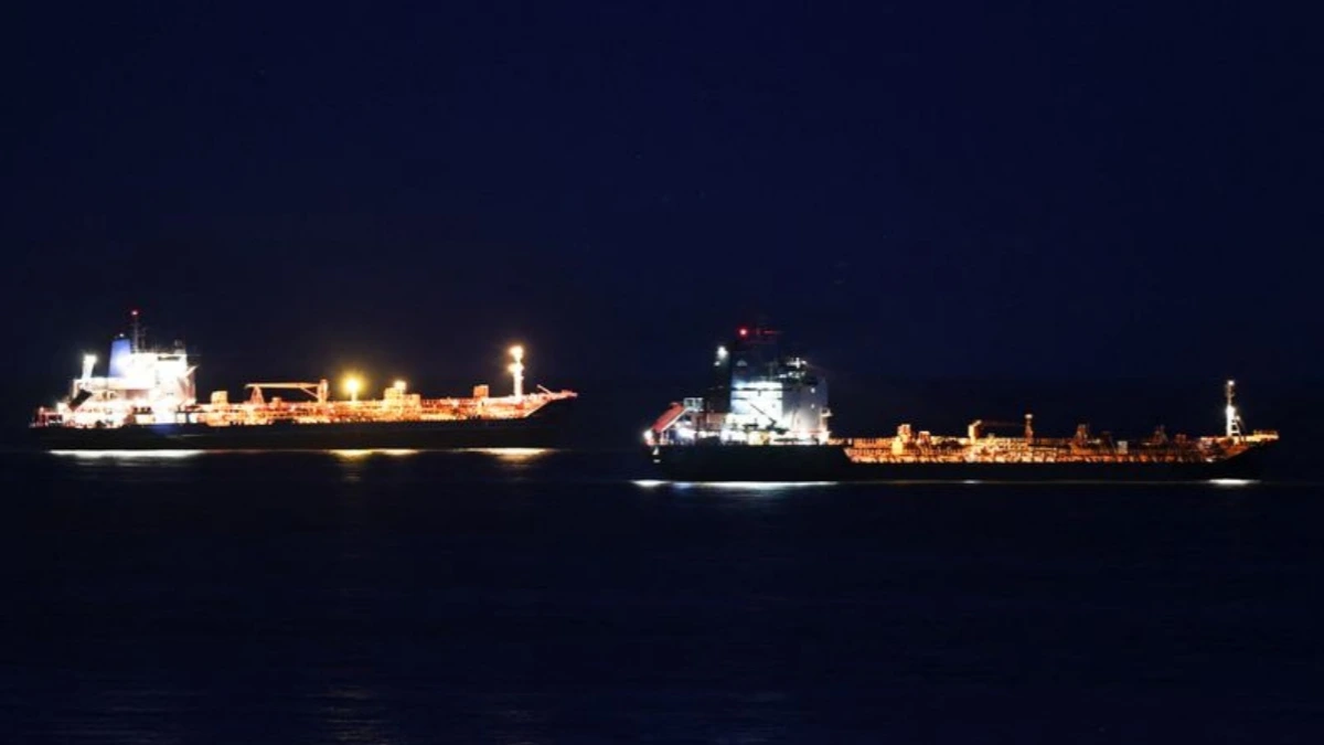 EU and G7 officials discussing maritime services ban on Russian oil exports during sanctions planning meeting.