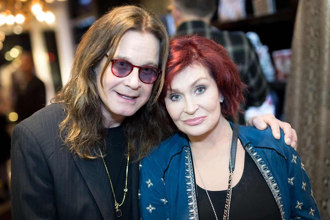 Sharon Osbourne meets fans at Merlin's Cafe Bar during Ozzy Day celebrations in Birmingham honoring Ozzy Osbourne's legacy.