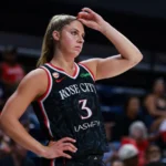 Sarah Ashlee Barker of the Portland Fire reacts during a WNBA game before exiting with a left leg injury against the Dallas Wings.