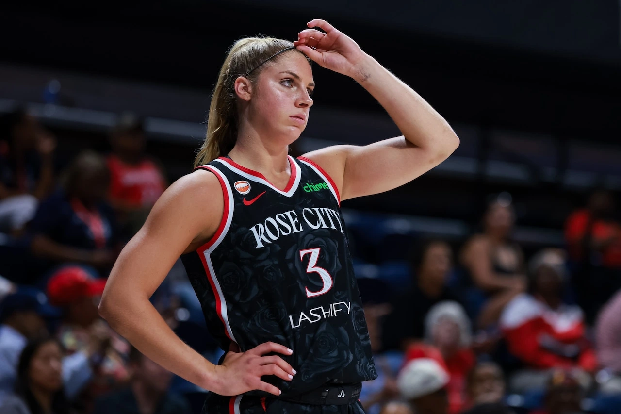 Sarah Ashlee Barker of the Portland Fire reacts during a WNBA game before exiting with a left leg injury against the Dallas Wings.
