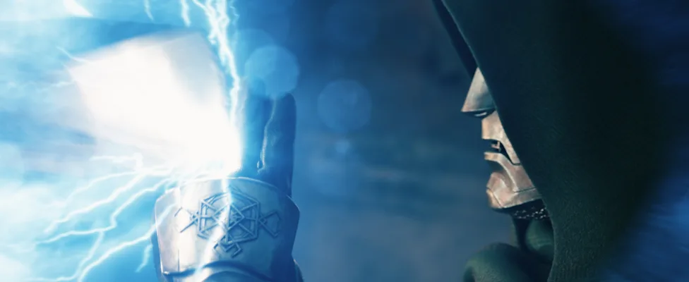 Doctor Doom raises a glowing armored hand as blue lightning crackles around his fingers in a dramatic scene from the Avengers: Doomsday trailer.