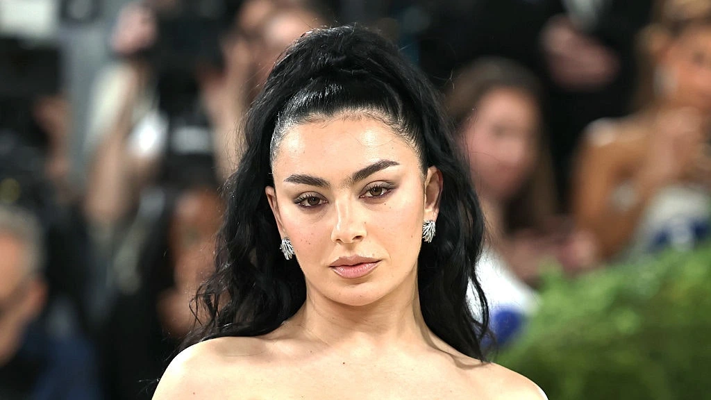 Charli XCX promoting her album Music, Fashion, Film, highlighting her artistic evolution after the success of Brat.