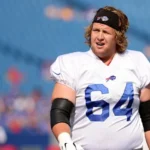 Jordan Devey wearing Buffalo Bills jersey before his death at 38