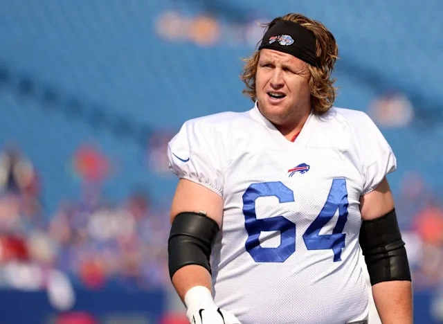 Jordan Devey wearing Buffalo Bills jersey before his death at 38