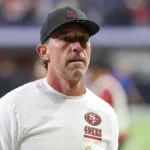 Kyle Shanahan on the sideline before his car accident injuries update