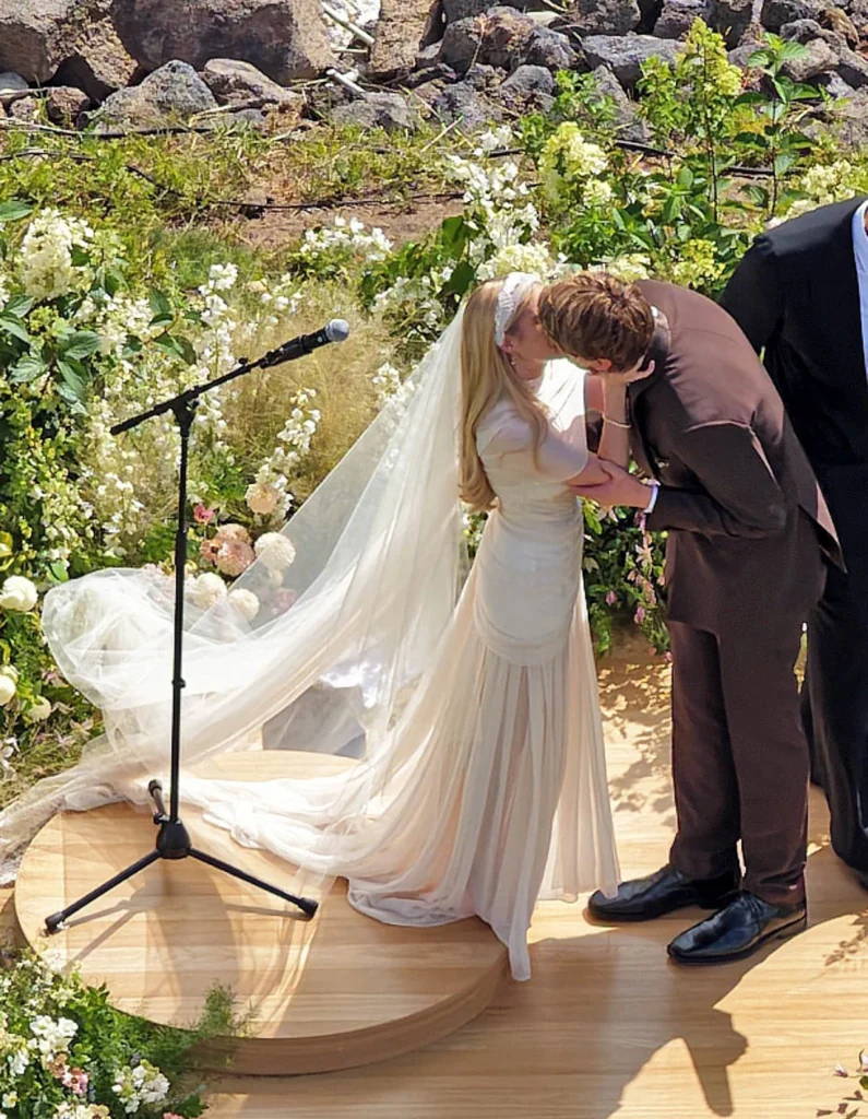 Emma Roberts and Cody John celebrate their wedding during a private outdoor ceremony in Sun Valley, Idaho.