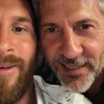Football star posing with his father in a close-up selfie