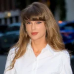 Taylor Swift shorter hairstyle debut in London after her wedding to Travis Kelce, showing her shoulder-length hair and signature bangs.