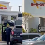 Police respond outside an In-N-Out Burger in Twin Falls, Idaho, as an armed suspect is seen near the restaurant during the Idaho In-N-Out shooting.