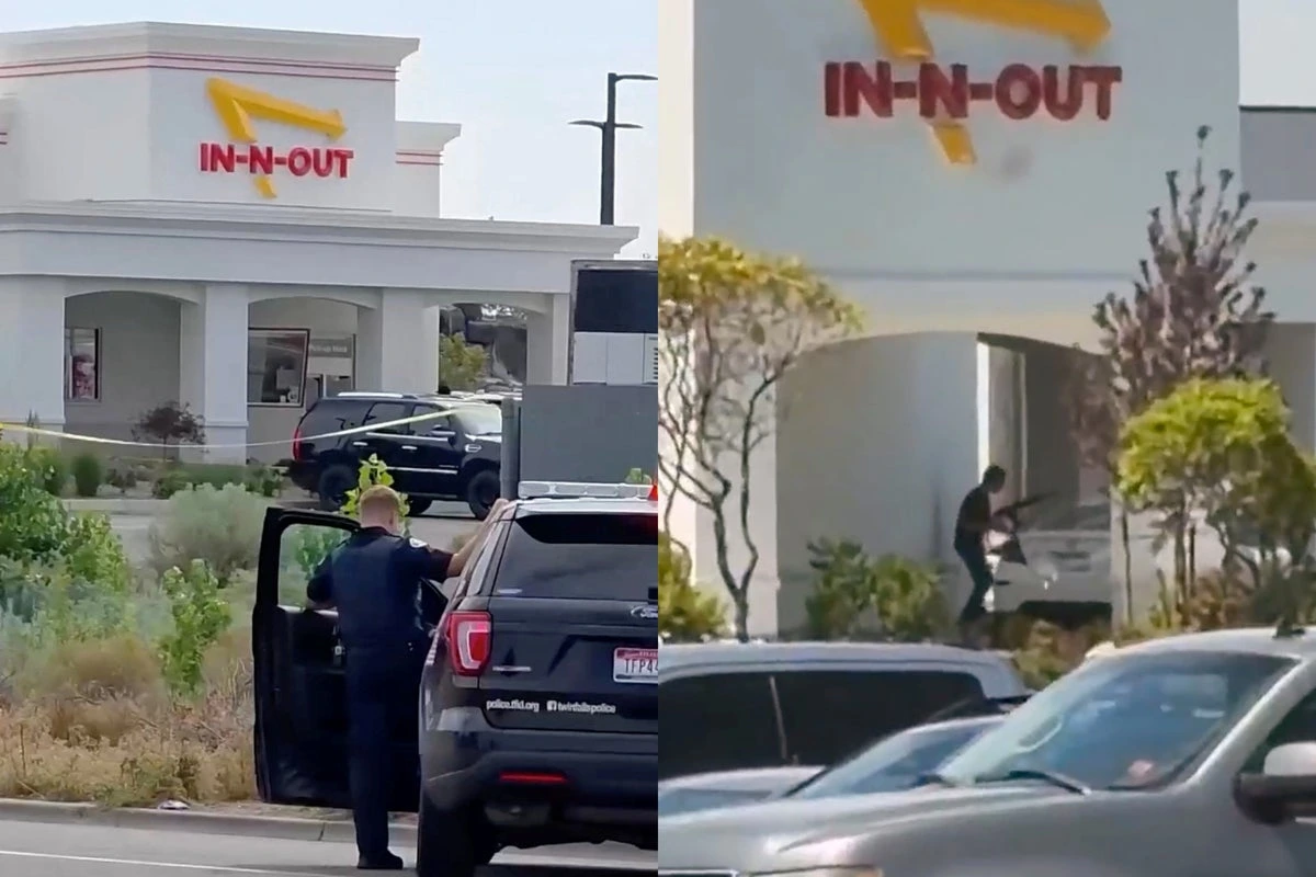 Police respond outside an In-N-Out Burger in Twin Falls, Idaho, as an armed suspect is seen near the restaurant during the Idaho In-N-Out shooting.