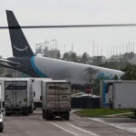 Amazon cargo plane Miami airport after 21 Air Flight 7598 overran the runway at Miami International Airport.