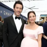 Kaley Cuoco and Tom Pelphrey at the 2026 Emmys red carpet, with Cuoco showing her baby bump in a pink gown