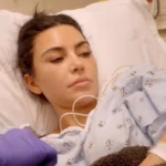 Kim Kardashian reveals esophagitis while lying in a hospital bed in The Kardashians season 8 trailer