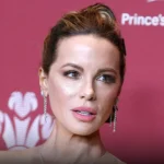 Kate Beckinsale Instagram post featuring a black background and the word “bye”