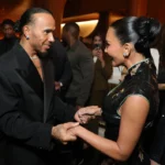 Kim Kardashian and Lewis Hamilton holding hands at the Lucas Museum opening in Los Angeles