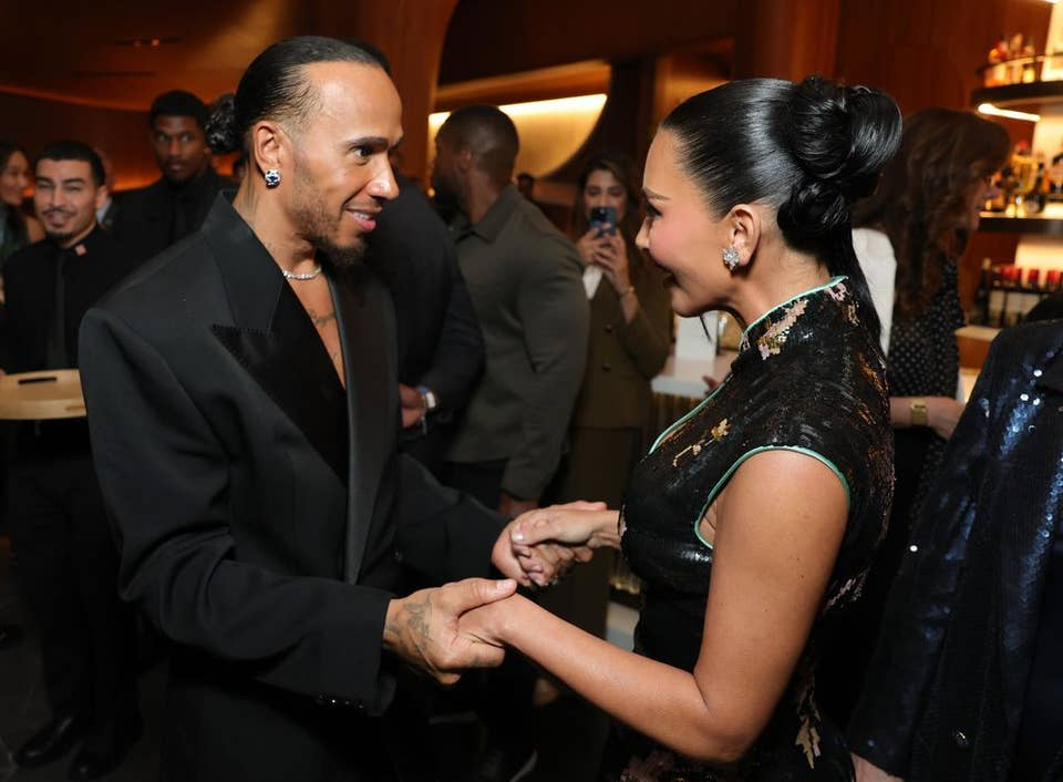 Kim Kardashian and Lewis Hamilton holding hands at the Lucas Museum opening in Los Angeles
